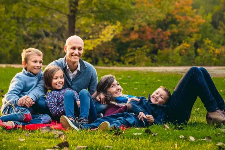 fall family portrait laying on grass