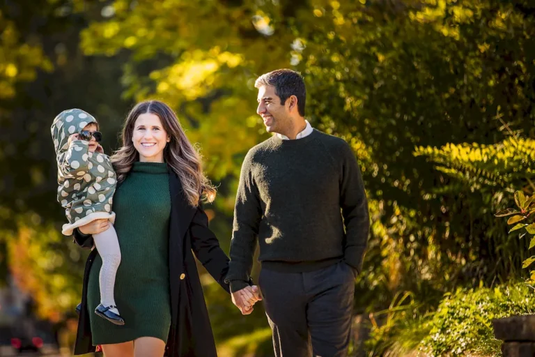 Family walking together on the sidewalks of East York for their family photography session