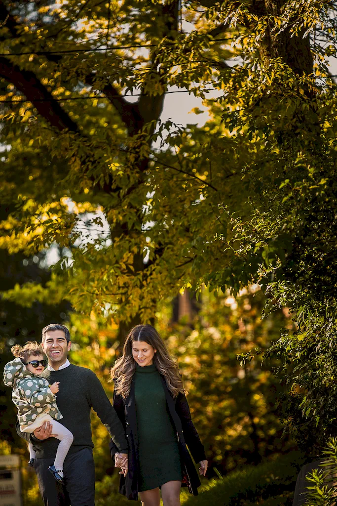 Fall Family photography walking along the sidewalks of East York, Toronto.