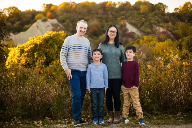 A full length fall family portrait with the stunning Scarborough Bluffs as the backdrop.